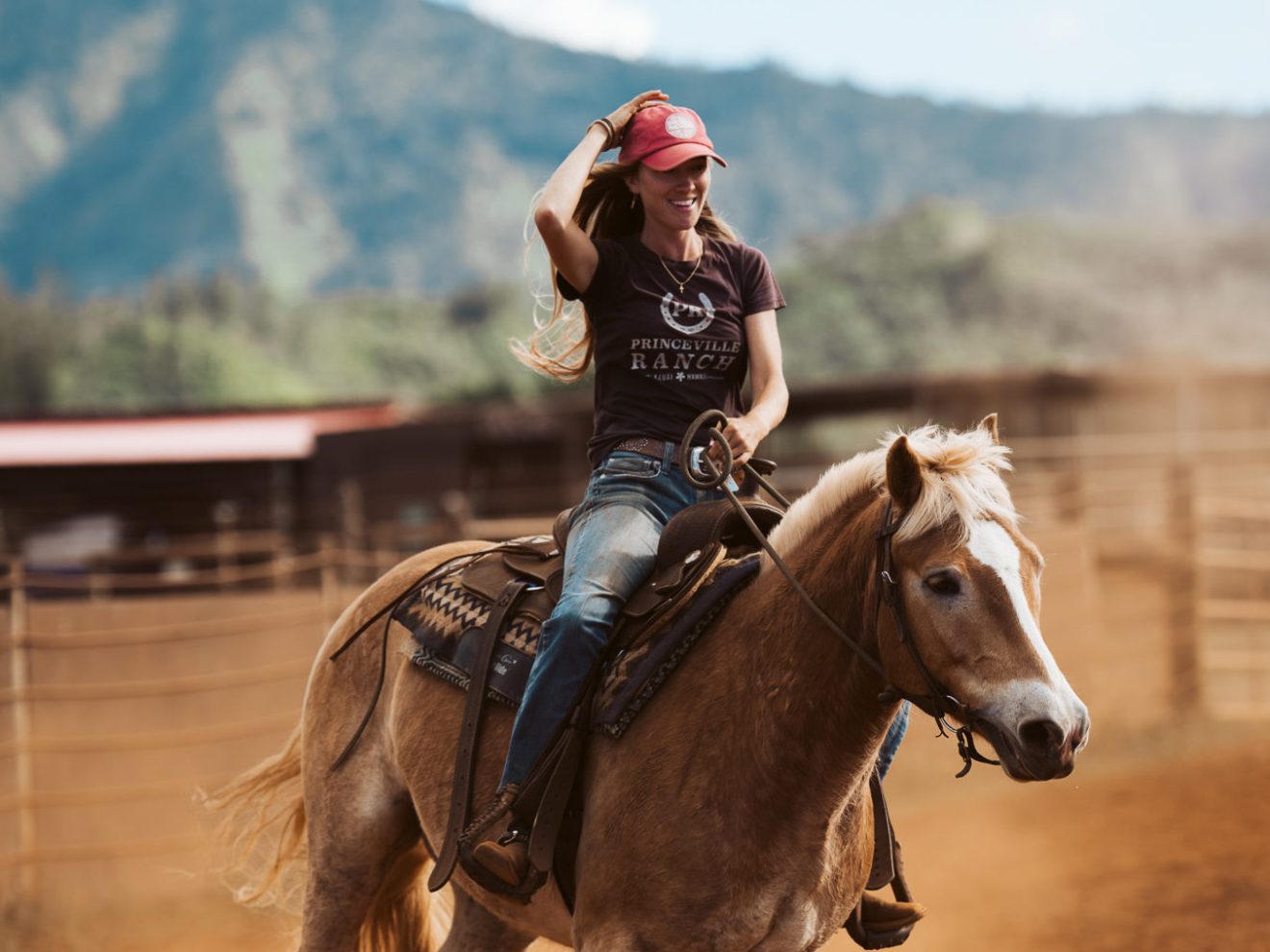 a person riding a horse in the dirt