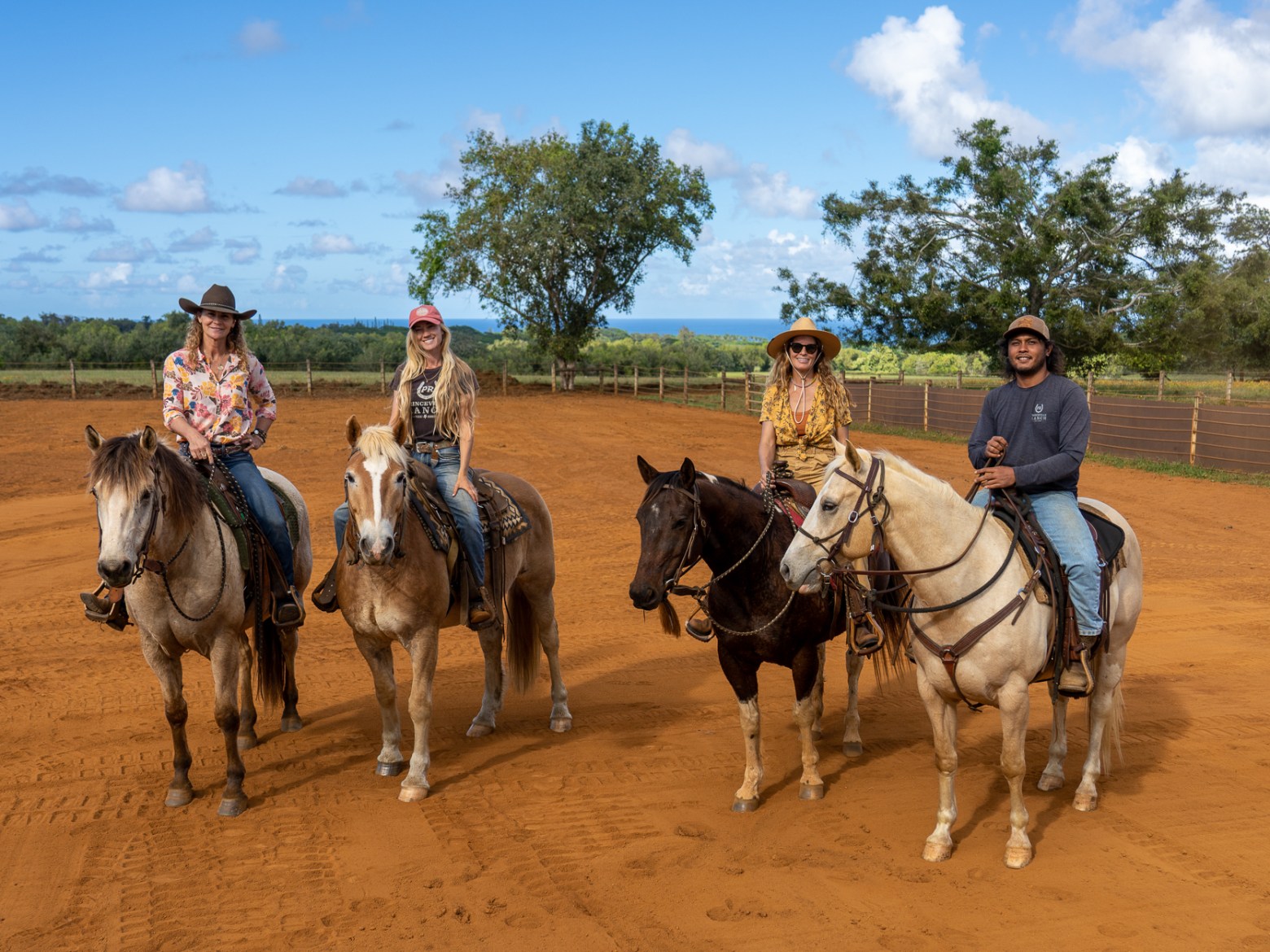 a group of people riding on the back of a horse