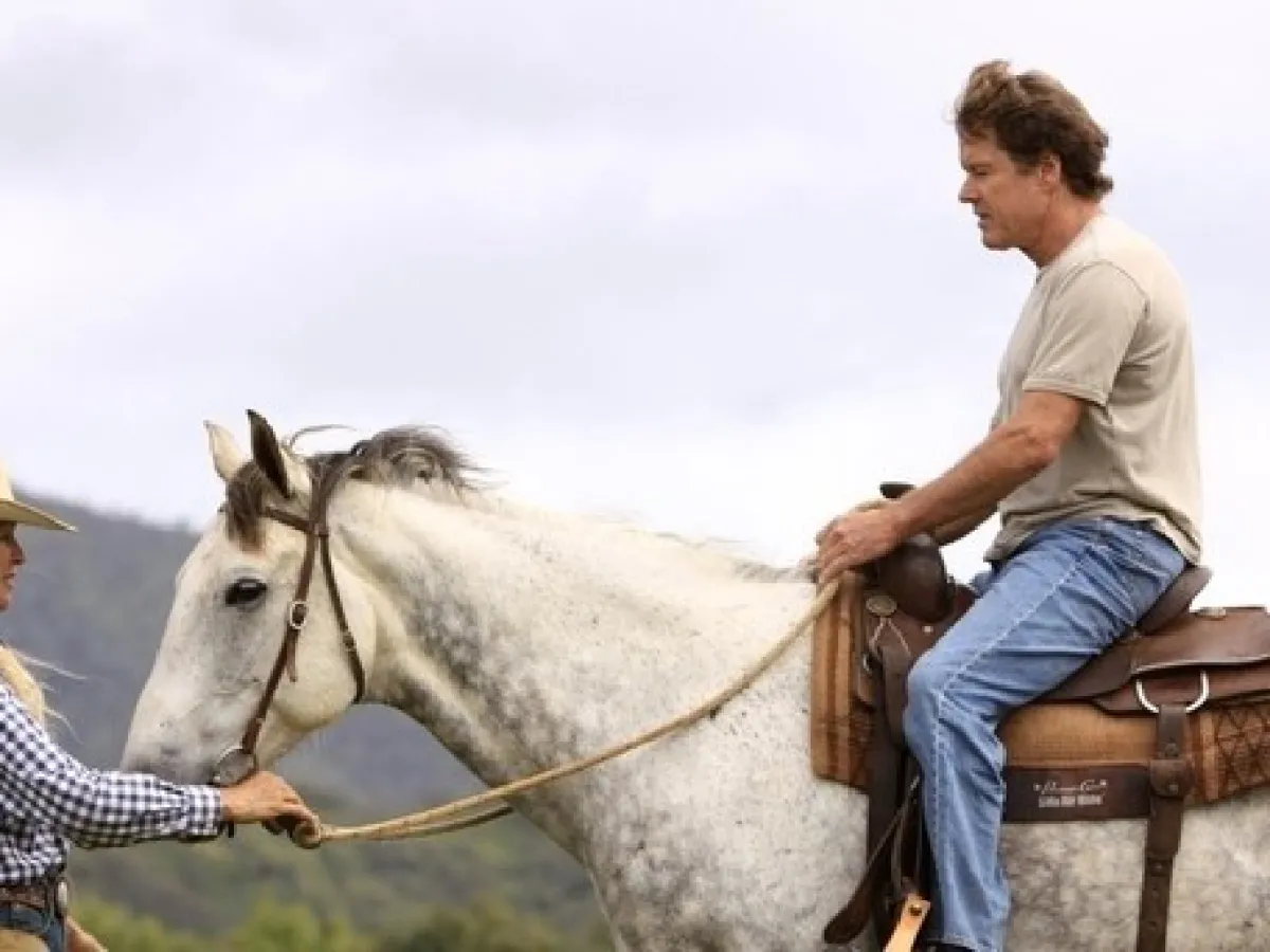 a man riding a horse