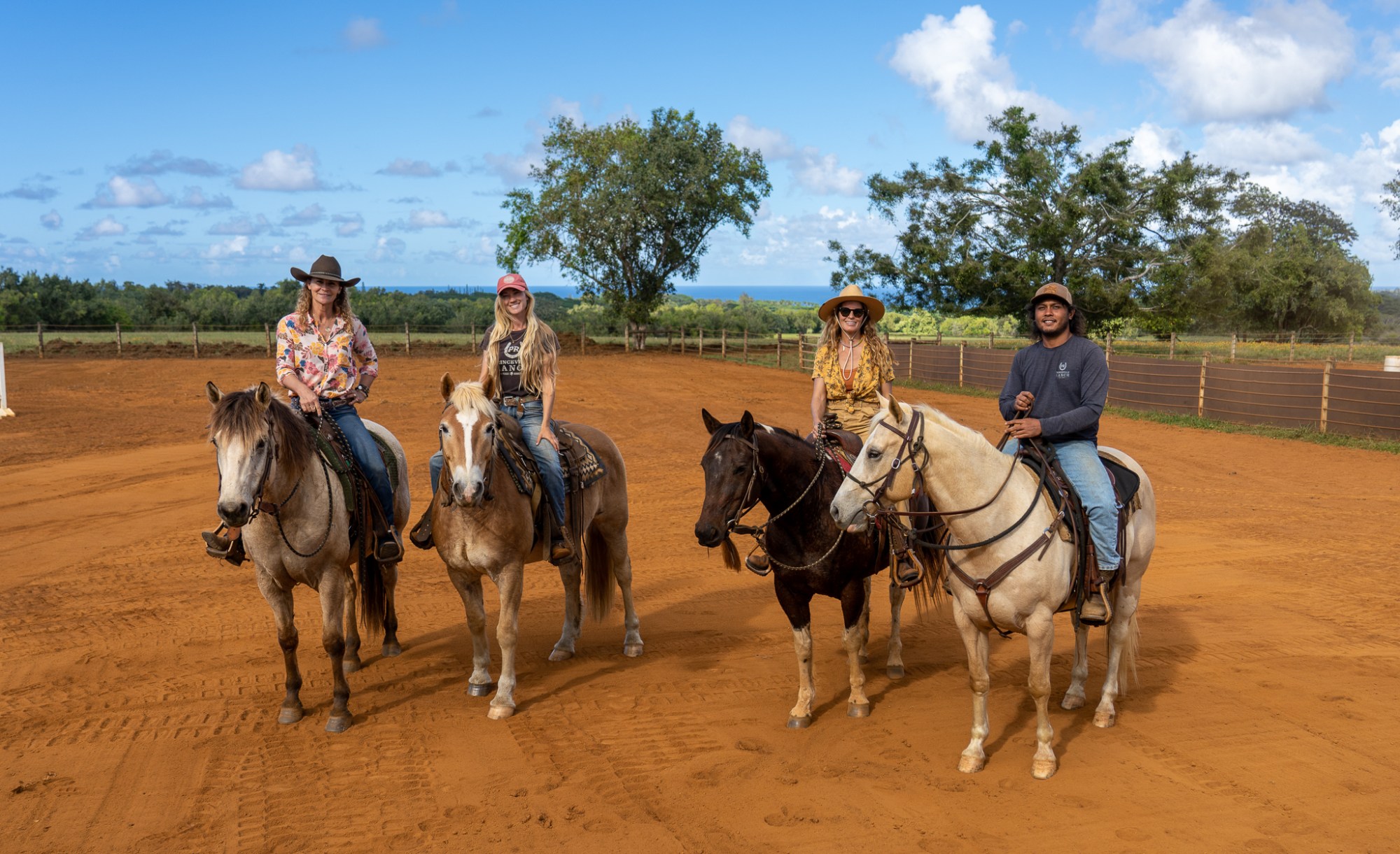 a group of people riding on the back of a horse
